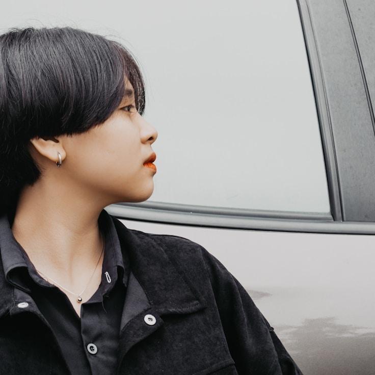 Portrait of Aria Chen, group coordinator and fusion cooking expert